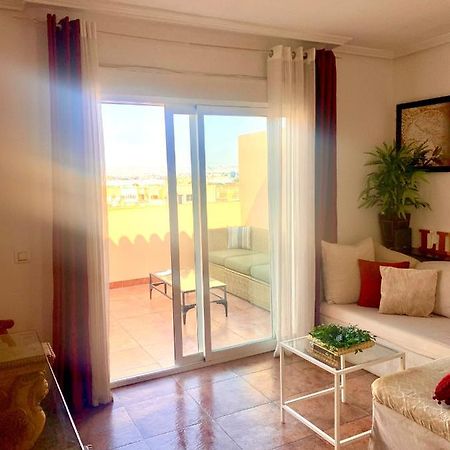 ÁTICO DELUXE entre CENTRO y PLAYA Salinas con TERRAZA, WIFI, PISCINA climatizada, GYM, SAUNA y GARAJE -Smart TV Roquetas de Mar Esterno foto