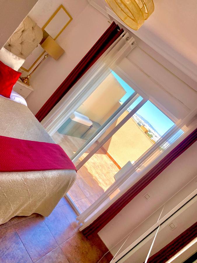 ÁTICO DELUXE entre CENTRO y PLAYA Salinas con TERRAZA, WIFI, PISCINA climatizada, GYM, SAUNA y GARAJE -Smart TV Roquetas de Mar Esterno foto