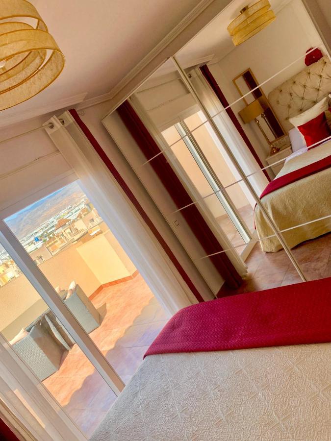 ÁTICO DELUXE entre CENTRO y PLAYA Salinas con TERRAZA, WIFI, PISCINA climatizada, GYM, SAUNA y GARAJE -Smart TV Roquetas de Mar Esterno foto